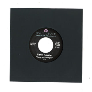 A black vinyl record sleeve with a central black record label reading Konbini Classics, featuring Yurie Kokubu's 'Dancing Tonight' at 45 RPM.