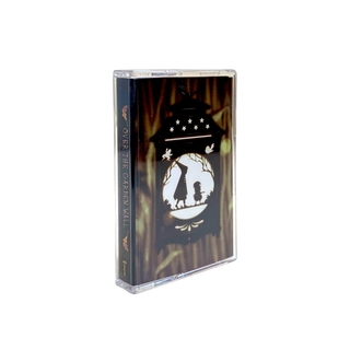 A cassette-style music case standing upright on a white background. The case is transparent, showing dark printed artwork inside with a lantern-like silhouette design and the text 'OVER THE GARDEN WALL' visible on the side.