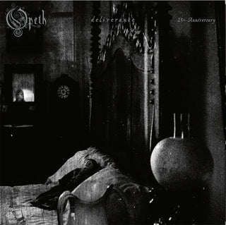 Speth 'deliverance' 25th Anniversary album cover art, featuring a dark, grainy black and white photograph of a bed with a figure lying on it, a large ornate headboard, and a round vase in the foreground.