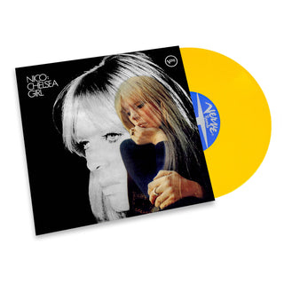 Nico & Chelsea Girl vinyl record album with a black-and-white cover photo and a translucent yellow record partially visible behind the sleeve. A blue circular label is visible on the record, and the VHS logo appears in the top right corner of the sleeve.