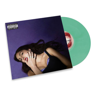 A vinyl record album shown at an angle with the square album cover in front and a translucent mint green record partially visible behind it on a white background.