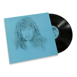 Vinyl record album with a light blue cover featuring a sketch-style portrait of a person with long hair, with the black vinyl record partially visible behind it on a white background.