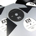 XL Recordings: Pay Close Attention Vinyl 4LP Boxset close up